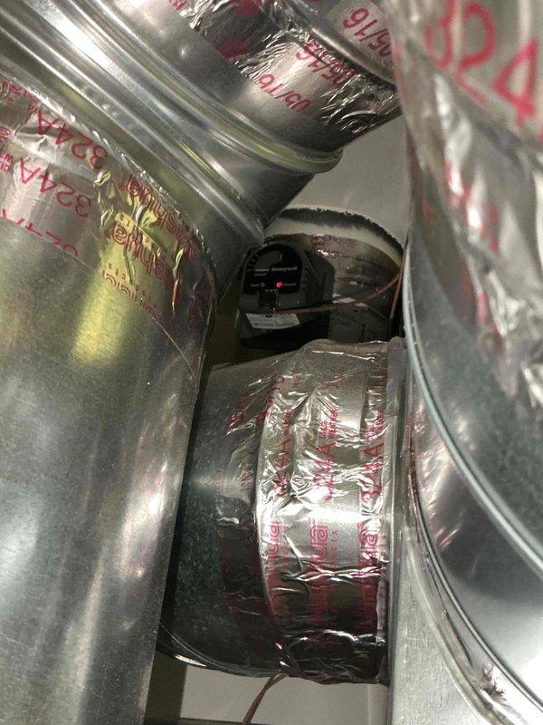 Responded to no cooling call for master bedroom. Upon inspection, found damper in supply duct branch serving master bedroom was in closed position. Opened damper to restore airflow to affected room. Verified adequate airflow and cooling delivery to master bedroom upon completion.