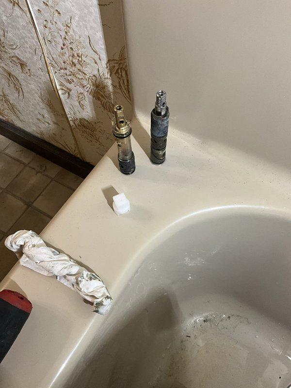 Responded to a leaking shower faucet that would not turn off completely. Removed and replaced worn cartridges from the over 40-year-old fixture, which had deteriorated due to age and mineral buildup. Tested the repaired faucet to confirm proper operation and complete shut-off with no further leaking.