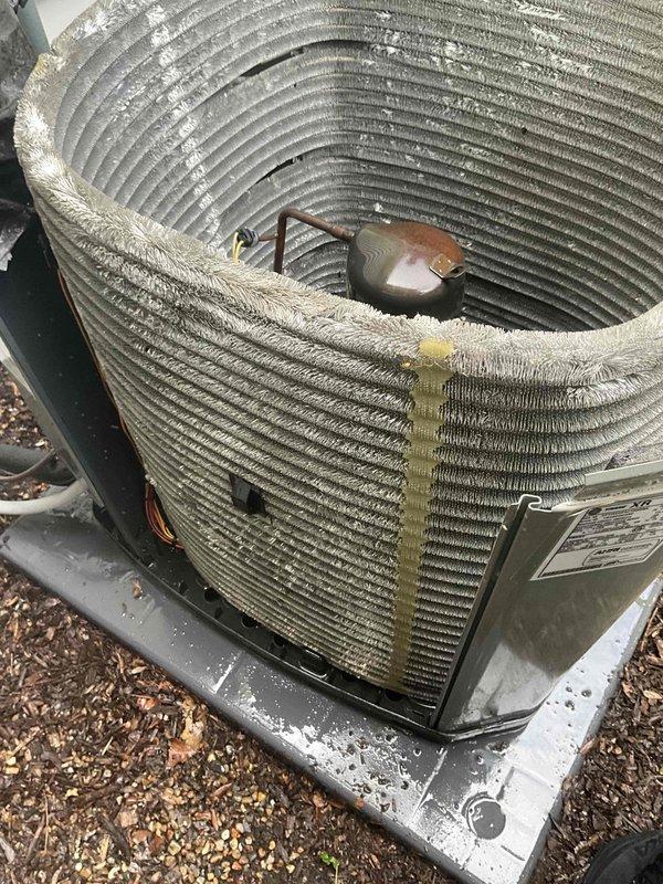 Completed comprehensive BFMA air conditioning tune-up on 7-year-old outdoor condensing unit. Performed visual inspection revealing significant dust, debris, and lint accumulation throughout condenser coil fins and fan blade assembly. Cleaned condenser coils, removed debris buildup from fan blades and surrounding components, inspected all accessible mechanical components including motor housing and mounting hardware, and verified proper operation of system upon completion.