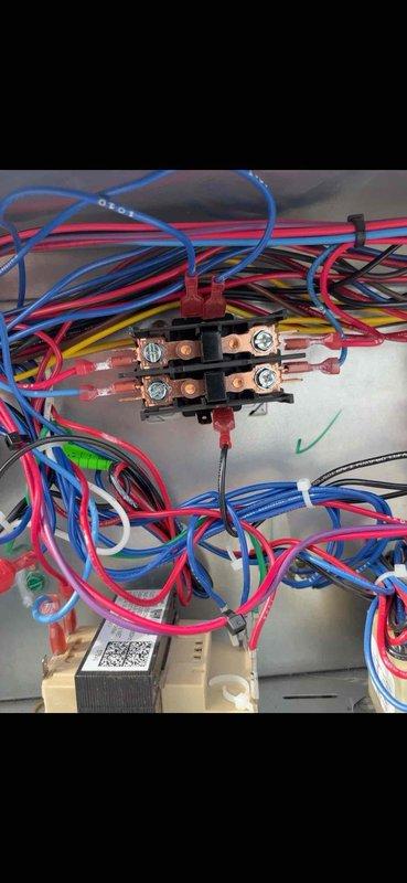 Responded to commercial no cooling call for RTU serving lower level offices. Upon arrival, inspected unit and found control board and contactor wiring connections. Evaluated electrical components including terminal blocks, capacitor, and circuit board assembly. Diagnosed issue with cooling system, verified proper wiring connections at contactor and control board terminals, and restored unit to normal cooling operation.