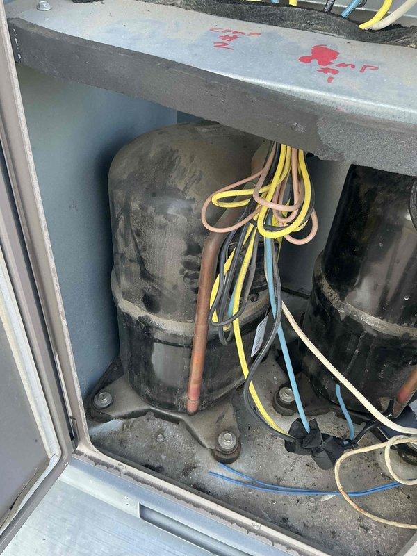 Responded to service call for multiple rooftop units not cooling laboratory section of commercial building since beginning of summer season. Performed diagnostic inspection on RTU#1, accessing electrical disconnect and internal compressor compartment. Found compressor and internal components heavily contaminated with dirt, grime, and operational residue indicating lack of preventive maintenance. Documented equipment condition with photos showing significant buildup on compressor, deteriorated wiring connections, and overall system neglect. Diagnostic fee applied for initial assessment of non-cooling units serving critical laboratory space during standard business hours.