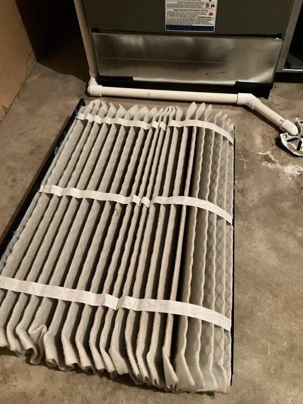 Completed comprehensive BFMA tune-up service on 7+ month old air conditioning system. Performed thorough inspection of blower motor assembly, verified proper electrical connections and wiring integrity, and assessed overall system operation. Confirmed adequate supply of clean replacement filters on-site and documented equipment condition with standard maintenance photography.