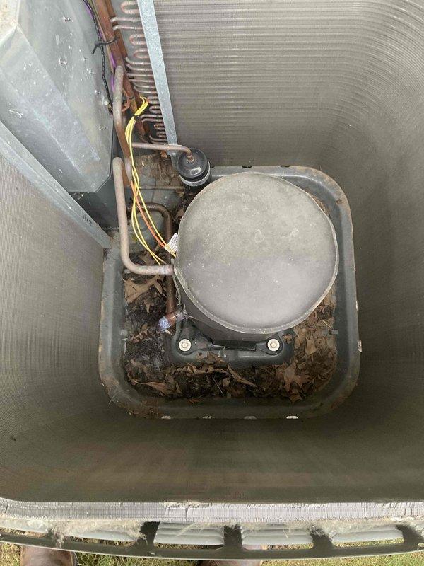Completed comprehensive BFMA tune-up service on 4+ year old air conditioning system during early morning appointment. Performed standard maintenance protocol including inspection of compressor, refrigerant lines, condenser coil, and electrical connections. Removed accumulated debris, leaves, and organic matter from base pan and unit interior to ensure proper drainage and airflow, documented equipment condition with photographs, and verified all components operational upon completion.