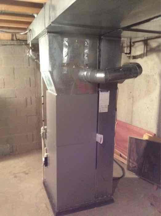 Conducted sales estimate for residential cooling system failure. Evaluated existing HVAC equipment in basement utility area, including furnace, air handler, and ductwork configuration. Documented current system installation with photographs showing equipment condition, plenum connections, and existing infrastructure to provide comprehensive replacement proposal for air conditioning unit and evaporator coil.