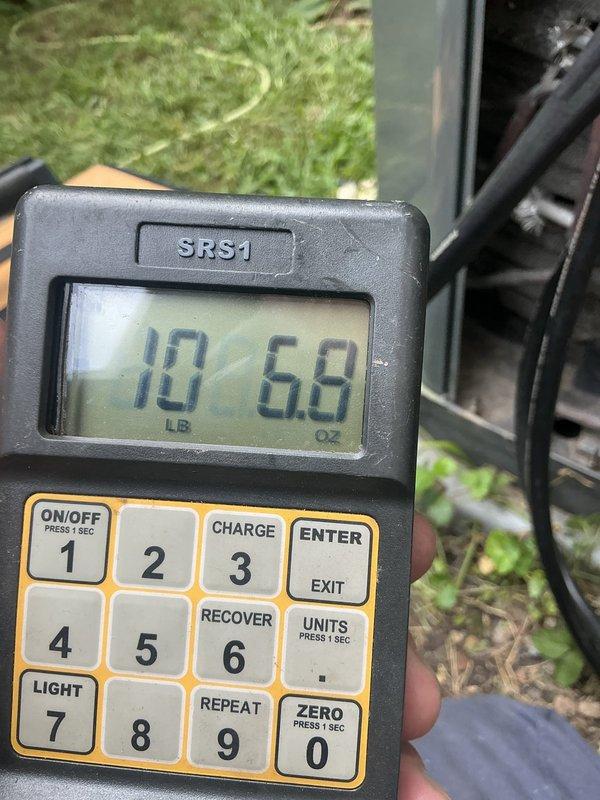 Responded to service call for outdoor condensing unit requiring high pressure switch replacement. Upon arrival, connected manifold gauge set to service ports to diagnose system pressures and confirm high pressure switch failure. Verified part availability staged at headquarters and proceeded with replacement. Successfully removed faulty high pressure switch and installed new component per manufacturer specifications. Performed refrigerant charge verification using calibrated electronic scale, measuring 10.68 pounds to ensure proper system charge levels. Tested all electrical connections and confirmed proper system operation with new high pressure switch functioning correctly. Unit restored to normal operating condition with appropriate pressures achieved throughout system.