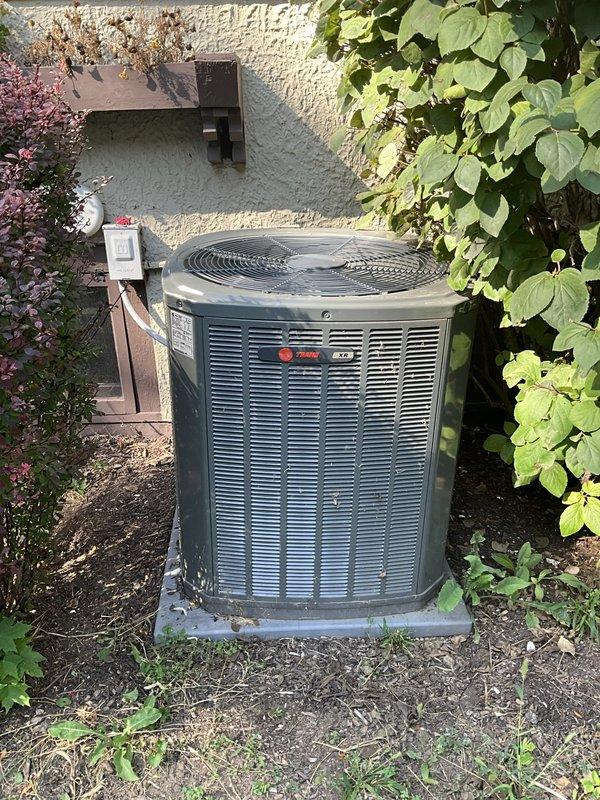 Responded to service call for air conditioning system not cooling adequately. Performed comprehensive system evaluation of Trane outdoor condensing unit, including inspection of condenser coils, fan assembly, and electrical components. Verified proper operation of condenser fan motor and assessed coil condition for airflow restrictions or debris accumulation that could impact cooling performance.
