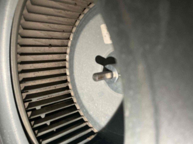 Responded to after hours service call for HVAC system malfunction. Upon inspection, found blower wheel assembly with moderate dust and debris accumulation affecting airflow efficiency. Examined outdoor condensing unit and identified disorganized wiring connections at control board with multiple loose wire terminations. Cleaned blower wheel assembly, secured all electrical connections, and verified proper system operation before departure.