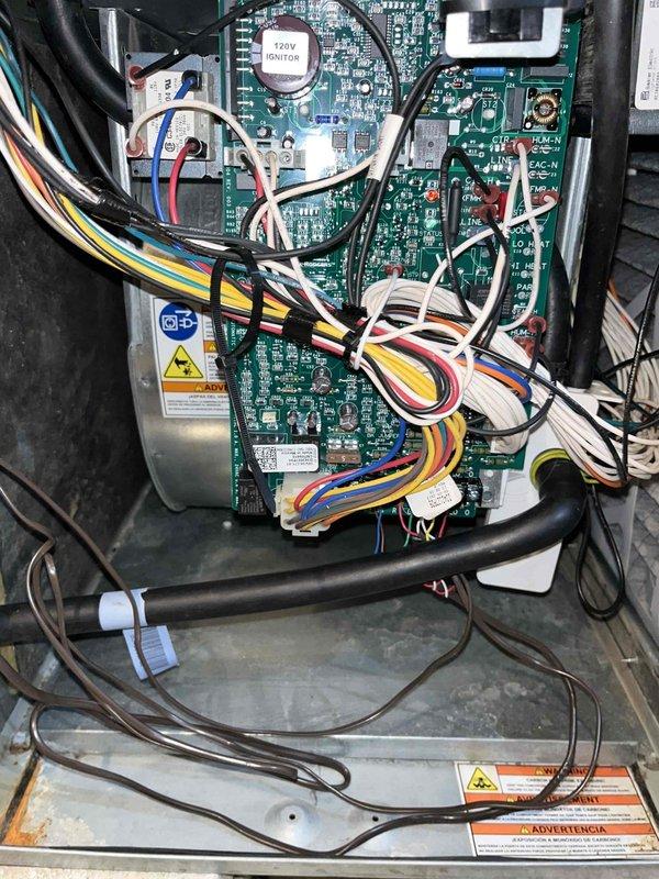 Completed fall heating system tune-up and routine maintenance on furnace with no reported issues. Performed comprehensive inspection of control board assembly, verified all electrical connections and wire harnesses were secure, and confirmed proper operation of 120V capacitor and integrated control circuits. Inspected ductwork system and internal components, finding all systems functioning within normal parameters.