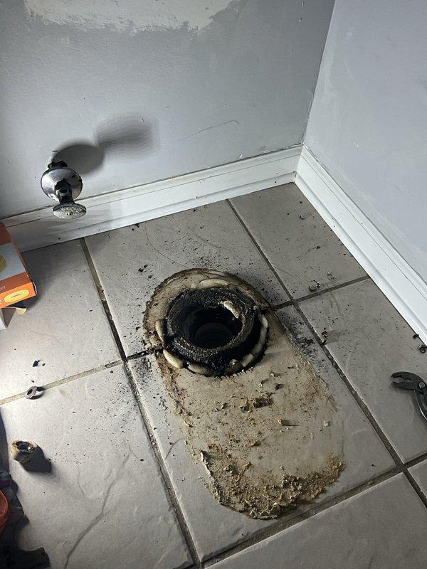 Removed and disposed of existing toilet from commercial powder room located near rear staircase. Installed new Kohler toilet with new wax ring, closet bolts, and water supply line. Verified proper seal and functionality upon completion.
