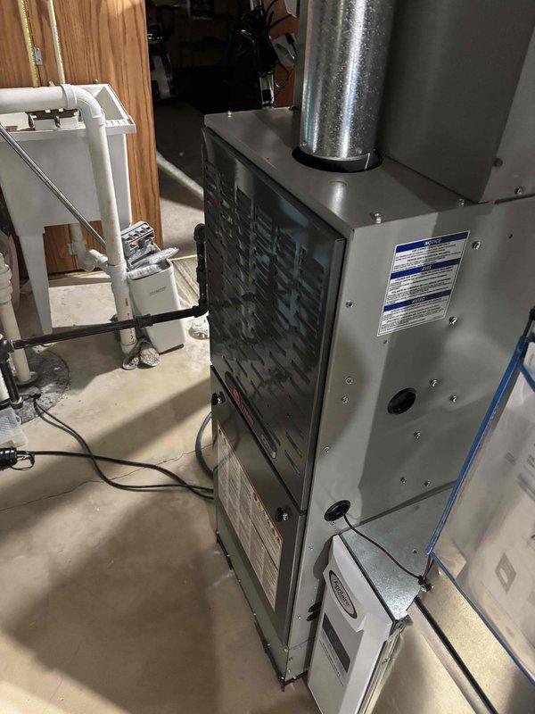 Completed comprehensive BFMA tune-up on residential gas furnace system per homeowner request with no operational concerns reported. Performed full system inspection including burner assembly cleaning, heat exchanger examination, blower motor lubrication, air filter replacement, thermostat calibration, and safety control testing. All components found operating within manufacturer specifications with system cycling properly and no deficiencies identified requiring immediate attention.