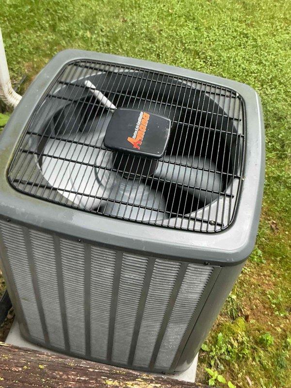 Completed comprehensive BFMA tune-up service on residential split system including one air conditioning unit and one furnace. Performed full system inspection, verified proper refrigerant levels as evidenced by appropriate condensation on copper refrigerant lines, confirmed outdoor condenser unit operation with adequate airflow through protective grille, and documented equipment condition with photographic records. All components operating within normal parameters with no immediate service concerns identified.