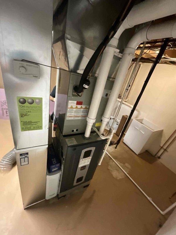 Performed comprehensive duct cleaning service for residential HVAC system. Accessed and cleaned interior metal ductwork, removing accumulated dust and debris from galvanized steel rectangular ducts throughout the system. Inspected duct integrity, connections, and access ports to ensure proper system operation. Cleaned and serviced basement mechanical room equipment including heating/cooling units and associated ductwork infrastructure, verifying all components are functioning properly and maintaining adequate airflow throughout the home.