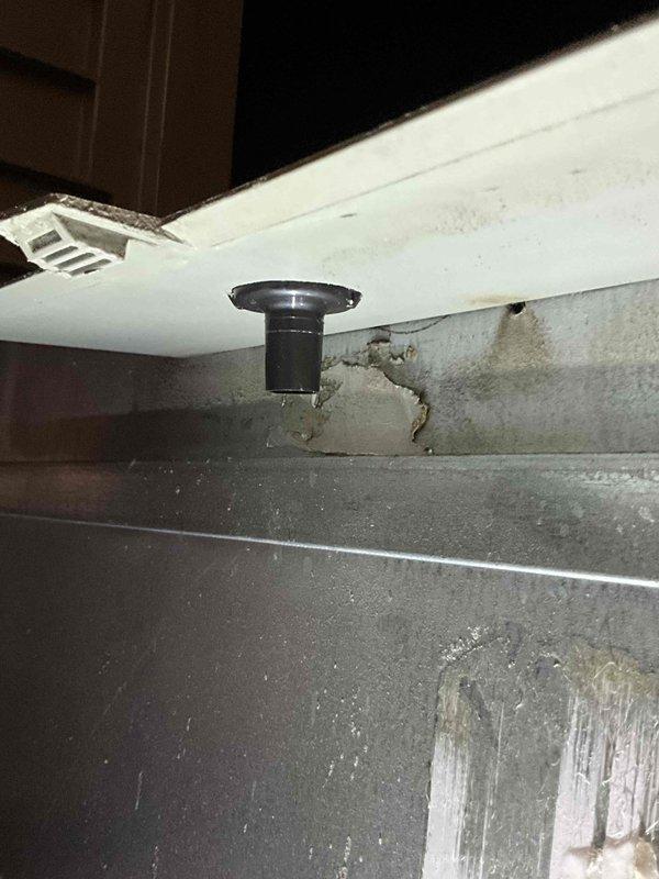 Returned to property to replace drain pan component that was damaged during previous maintenance visit. Removed and replaced broken drain fitting in HVAC unit. Inspected surrounding drain pan area for proper seal and functionality. Verified no active leaks present after installation of replacement part. Unit tested and operating normally upon completion.