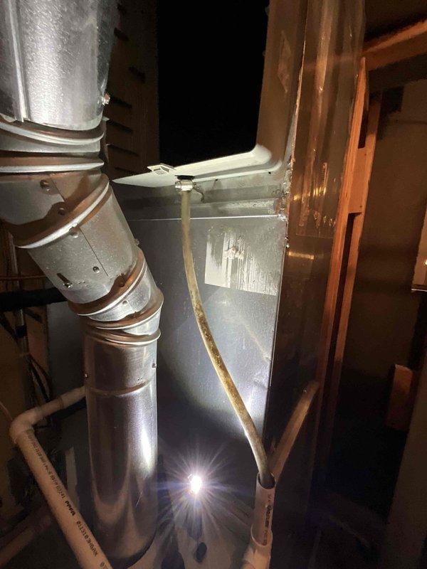 Returned to property to replace drain pan component that was damaged during previous maintenance visit. Removed and replaced broken drain fitting in HVAC unit. Inspected surrounding drain pan area for proper seal and functionality. Verified no active leaks present after installation of replacement part. Unit tested and operating normally upon completion.