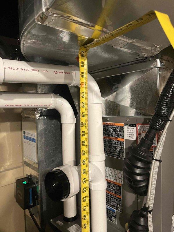 Responded to no cooling complaint on first floor 11-month-old Lennox split system. Upon arrival, inspected outdoor condenser unit and indoor air handler. Performed system diagnostics and visual inspection of both components. Unit found to be operating but not maintaining temperature setpoint on first floor zone. Verified upstairs system functioning normally. Measured and documented system specifications. Further troubleshooting required to identify root cause of inadequate cooling capacity on affected zone.