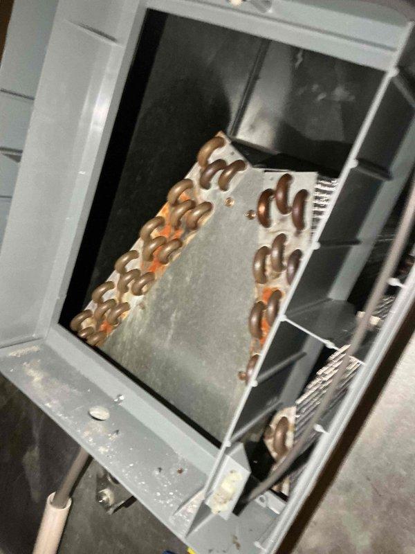Completed comprehensive BFMA tune-up service on 5-year-old furnace and humidifier system. Performed thorough inspection of evaporator coil assembly, verified proper refrigerant line configuration and copper U-bend tube integrity, and examined blower motor and fan operation within the HVAC housing unit. All components found to be in satisfactory working condition with system operating within manufacturer specifications.