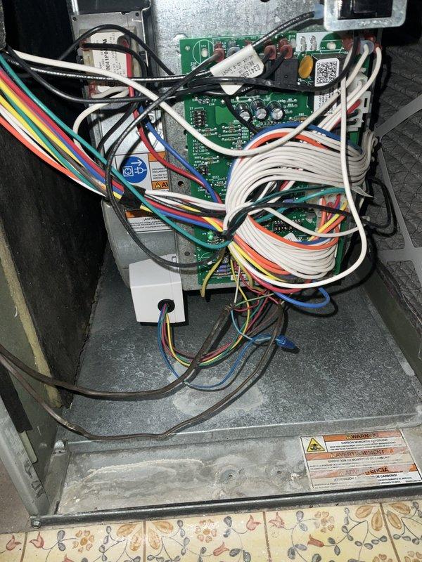 # HVAC Service - No Heat Call

Responded to no heat call on 7-year-old furnace located in closet/utility/laundry room. Upon arrival, performed diagnostic inspection of furnace control system and gas valve assembly. Accessed control panel and examined circuit boards, wiring harnesses, and electronic components for proper operation. Inspected gas valve, burner manifold, and associated piping for functionality and safety. Verified all electrical connections, including multi-conductor wiring and control circuits. Documented equipment condition through photographs showing control board assembly and gas valve system. All components inspected and tested to restore heating operation. System returned to normal working condition.