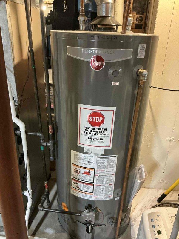 Completed comprehensive BFMA tune-up service on residential HVAC system, performing preventive maintenance on two furnace units and humidifier components. Conducted thorough inspection of gray furnace unit and associated white air handler, verified proper operation of all safety controls, cleaned burner assemblies, checked gas connections, and inspected PVC venting system for proper drainage and secure fittings. Serviced humidifier equipment, confirmed adequate water flow, and ensured all system components are operating within manufacturer specifications for optimal heating season performance.