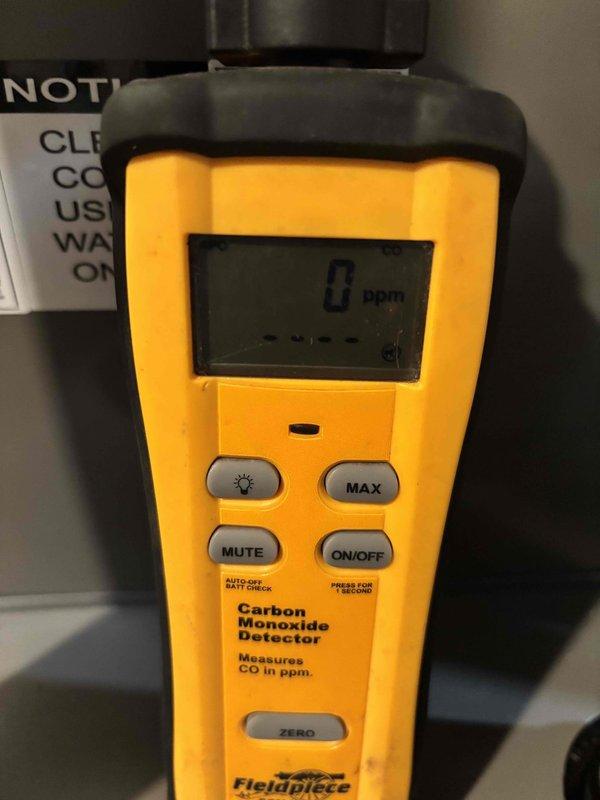 Completed comprehensive BFMA tune-up service including maintenance on two furnace systems and humidifier units. Performed standard safety testing including carbon monoxide detection with readings at 0 ppm, confirming safe combustion operation. Identified significant dust and lint accumulation on air filter housing and surrounding intake components, indicating need for improved filtration maintenance schedule.
