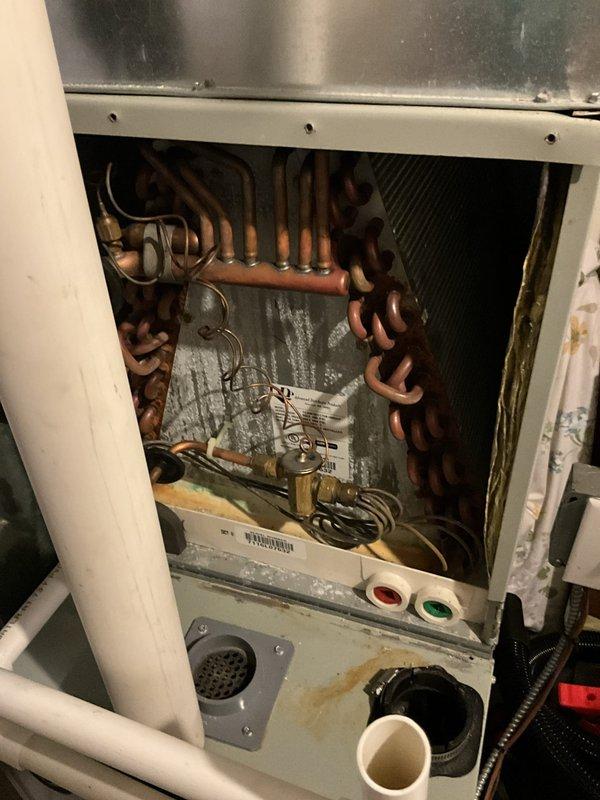Replaced defective evaporator coil under manufacturer's warranty with new piston-style coil. Retained and reinstalled existing thermostatic expansion valve (TXV) from original coil onto replacement unit to maintain proper metering device functionality. System inspected and verified operational upon completion.