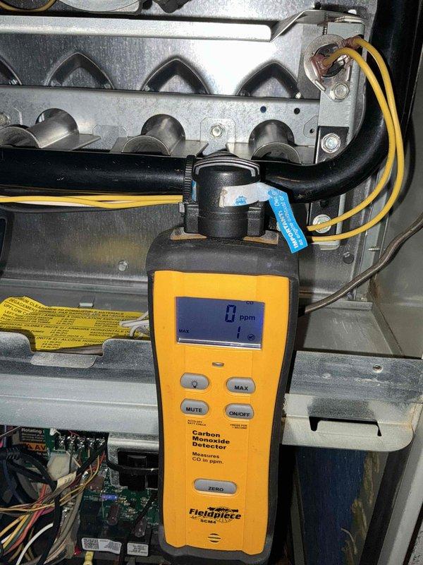 Completed comprehensive BFMA tune-up on 22-year-old furnace and humidifier system during scheduled afternoon appointment. Performed carbon monoxide safety testing with digital analyzer, confirming safe operation at 0 ppm. Inspected heat exchanger, combustion chamber, and all internal components for proper operation. Replaced #35 water panel on humidifier as part of recurring ESA service agreement. Tested all safety controls, verified electrical connections, and ensured system is operating within manufacturer specifications for the heating season.