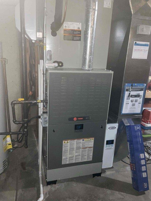 Completed comprehensive BFMA tune-up service on Trane furnace system including full furnace inspection, humidifier service, and semi-annual filter change. Performed combustion analysis, cleaned and adjusted burner assembly, verified proper airflow, inspected heat exchanger, and tested all safety controls. Serviced humidifier components and installed fresh filters to ensure optimal system performance and efficiency for the heating season.