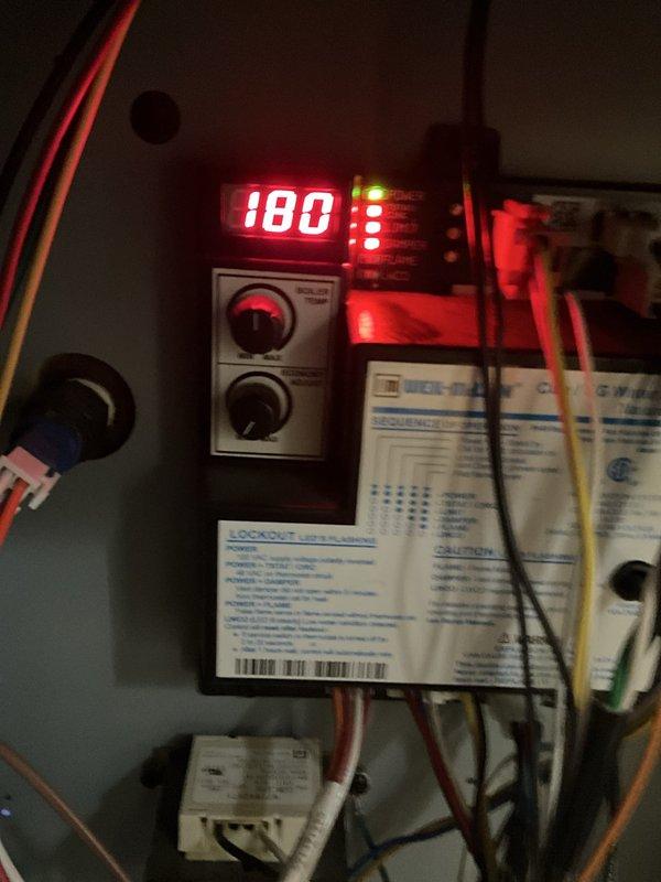 Completed comprehensive boiler tune-up service on Weil-McLain residential heating system as part of BFMA maintenance agreement. Performed full system inspection including control panel diagnostics, verified operational temperature at 180°F on digital display, tested all safety lockout controls and indicator lights, inspected circulator pump and pressure gauges for proper operation, examined copper piping network and brass fittings for leaks or corrosion, and verified proper function of expansion tanks and zone valves. All components found operating within manufacturer specifications and system left in optimal working condition.
