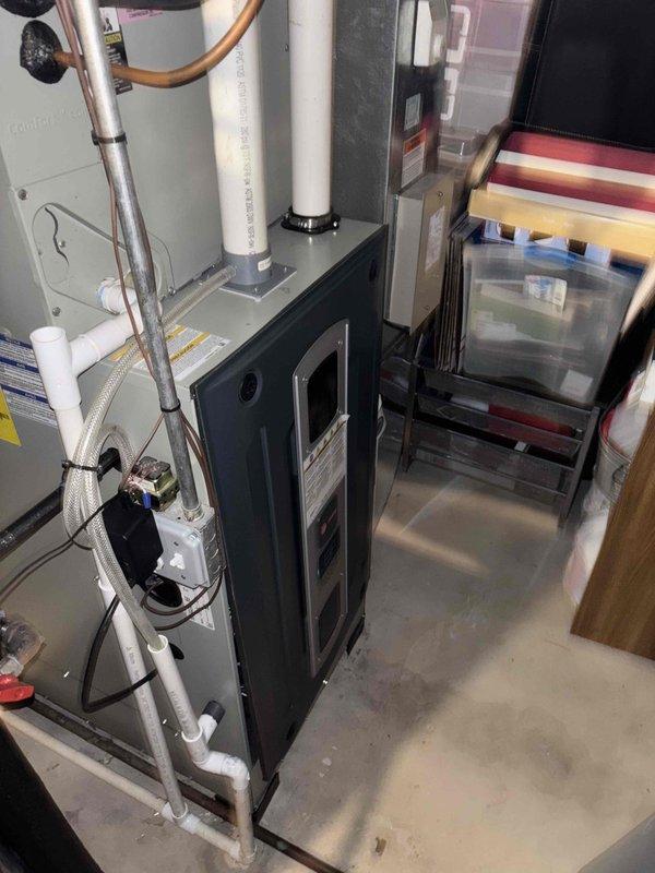 Completed comprehensive BFMA preventive maintenance service on residential high-efficiency furnace system and humidifier. Performed full system inspection, tested all safety controls, verified proper combustion with carbon monoxide readings at safe levels (1 ppm), cleaned and adjusted burner assembly, checked heat exchanger integrity, inspected and serviced whole-home humidifier, verified proper venting and condensate drainage through PVC piping system, tested blower motor operation, and confirmed all mechanical components operating within manufacturer specifications.