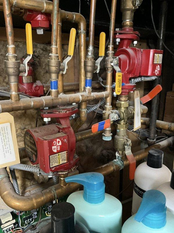 Completed comprehensive BFMA tune-up on 9-year-old residential boiler system with multi-zone circulator pump configuration. Performed full combustion analysis, inspected and tested all zone valves and circulator pumps for proper operation, verified manifold assembly and copper piping connections for leaks, cleaned and adjusted burner components, and confirmed all safety controls and emergency shutdown systems functioning correctly. System operating within manufacturer specifications with all zones heating properly.