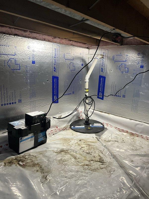 Inspected crawl space moisture control systems and sump pump installation. Documented existing conditions including reflective insulation installation, vapor barrier placement, and dehumidification equipment operation. Sump pump basin showed heavy sediment accumulation and requires cleaning when coordinated access with other contractors is available for comprehensive servicing.
