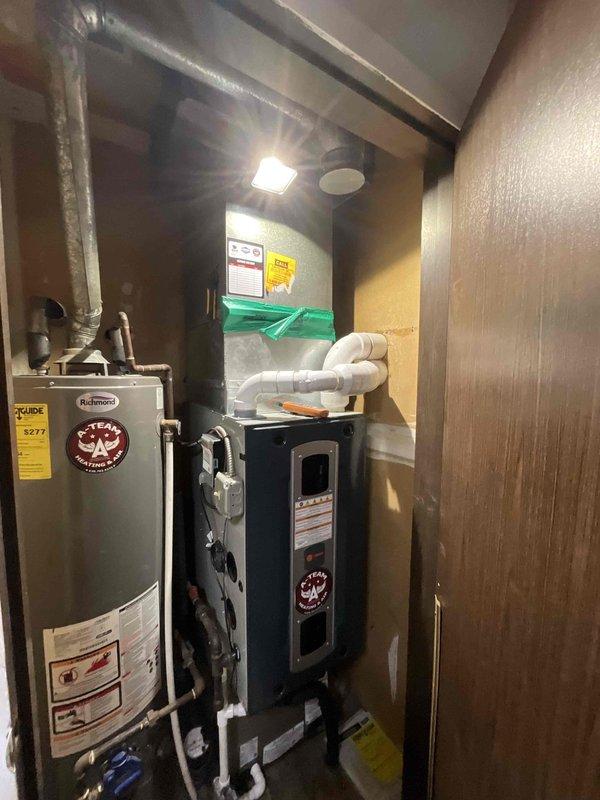 Completed comprehensive furnace tune-up on 9+ year old heating system in morning timeframe per customer availability. Performed full inspection of furnace unit located in utility closet alongside water heater, including examination of heat exchanger, burner assembly, blower components, and ductwork connections. Verified proper operation of digital control panel, tested safety controls, cleaned burners, checked gas pressure and combustion efficiency, inspected flue system and venting, and confirmed adequate airflow through supply and return ducts. All components found operating within manufacturer specifications with no immediate safety concerns identified. Unit returned to normal operation with optimal performance parameters.