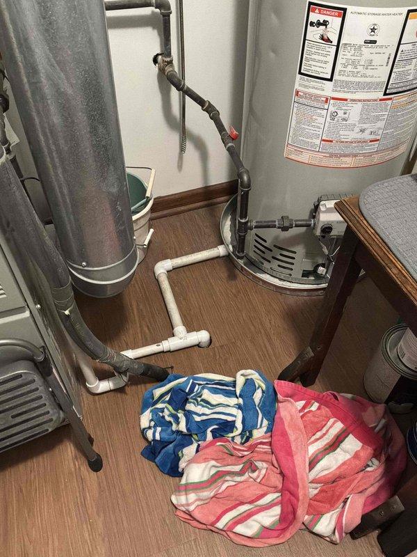 Responded to intermittent water leak in laundry room originating from HVAC unit. Upon inspection, identified condensate drainage issue with PVC piping system connected to condensate pump. Reconfigured and secured condensate drain lines, verified proper pitch and connections to ensure adequate drainage from air handler. Tested system operation and confirmed no active leaking; towels placed on floor to monitor for any residual moisture.