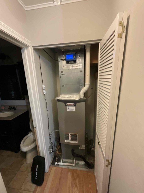 Completed comprehensive BFMA furnace tune-up on 13-year-old heating system located in utility closet. Performed full maintenance protocol including inspection of air handler unit, verified proper operation of all components, checked electrical connections, inspected PVC condensate drainage system, and tested thermostat functionality. All equipment operating within normal parameters upon completion of preventive maintenance service.