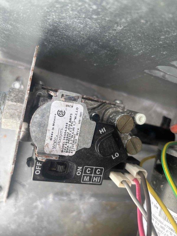 Returned to commercial location to complete gas valve replacement on HVAC heating unit. Retrieved pre-staged gas valve from headquarters and proceeded with installation. Removed failed gas valve assembly from burner manifold, disconnected all electrical connections including thermostat wiring and limit switch circuits. Installed new gas valve, reconnected all wiring per manufacturer specifications, and verified proper positioning of ON/OFF/pilot settings. Tested burner ignition sequence, confirmed flame proving operation, and verified proper gas flow to all burner tubes. System restored to full operational status with all safety controls functioning correctly.