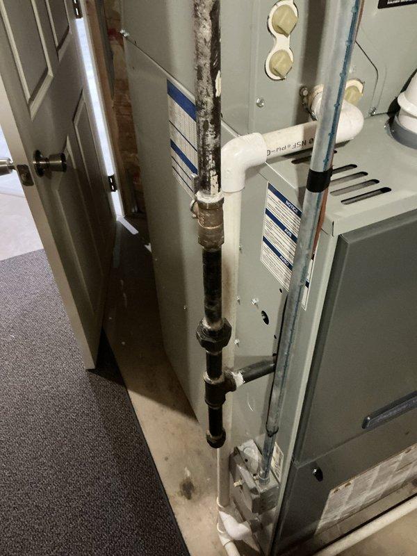 Completed full system estimate for furnace and humidifier replacement following unit shutdown due to cracked heat exchanger. Assessed existing HVAC system installed in basement utility area, documented current equipment configuration including furnace, air handler, and associated piping connections. Provided comprehensive replacement options for complete heating and cooling system to address safety concerns and equipment failure.