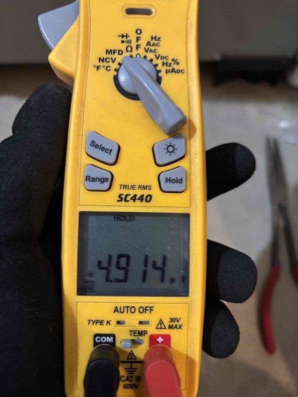 Completed comprehensive BFMA tune-up service on 4-year-old HVAC system including furnace and humidifier maintenance. Performed full system inspection, tested electrical components with multimeter confirming proper amperage draw at 49.14 amps, verified all safety controls and operational sequences. Inspected humidifier plumbing connections and PVC drainage system, confirmed proper installation and functionality of all components with no leaks detected.