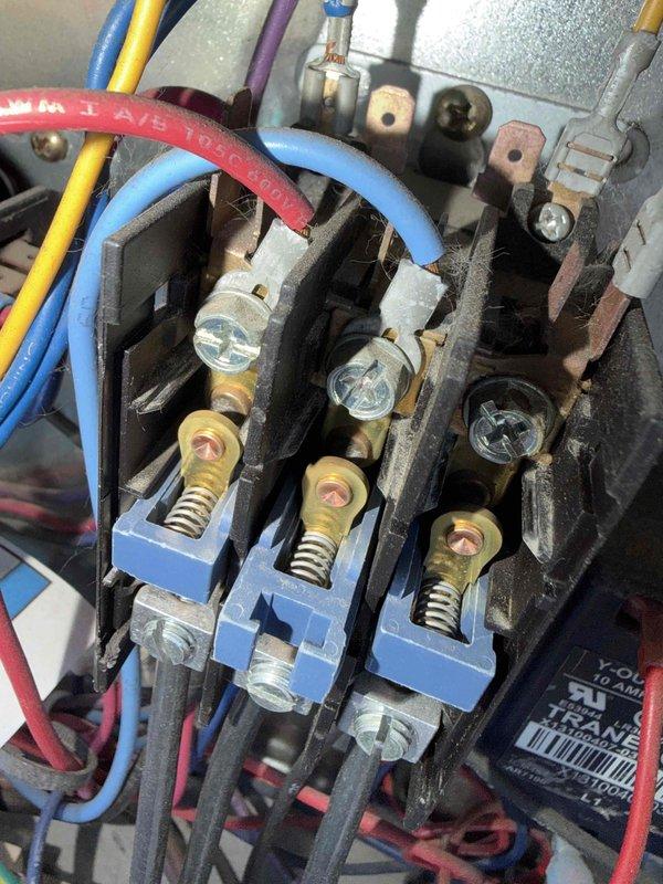 Completed comprehensive commercial tune-up service on four rooftop units, one boiler, and one hanging unit in lower level. Performed diagnostic testing using digital clamp meter to verify electrical parameters including voltage, amperage, and system performance across all equipment. Inspected and evaluated electrical connections, contactors, and terminal blocks; documented wiring conditions and component integrity with detailed photographs for service records.