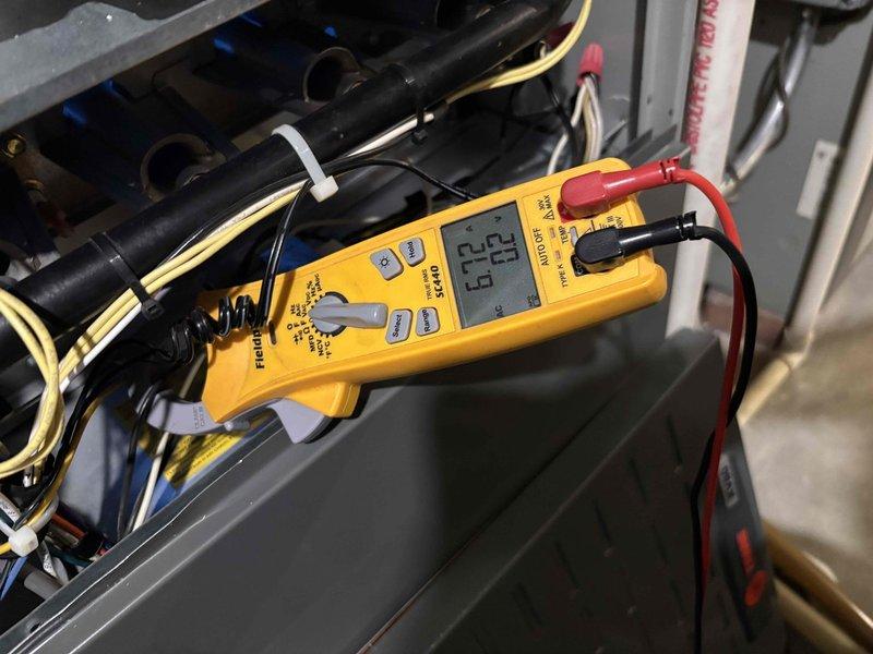 Completed comprehensive BFMA tune-up on 14-year-old furnace system including inspection of humidifier assembly with Aprilaire water panel and verification of electrical connections using digital multimeter. Performed standard maintenance procedures, tested system operation, and confirmed all components functioning within manufacturer specifications with electrical readings at appropriate levels.