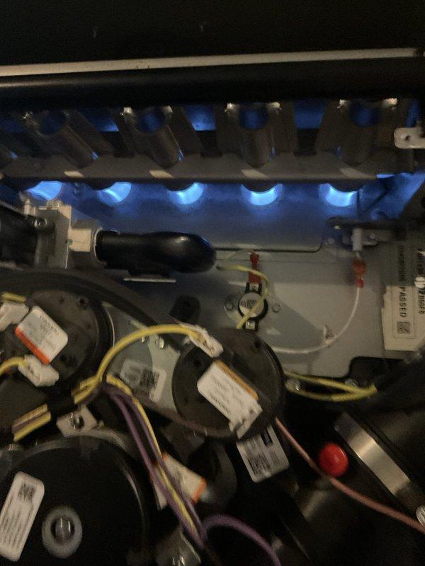 Completed comprehensive BFMA tune-up service on two gas furnaces and two humidifiers at the property. Performed thorough inspection of burner assemblies, confirmed proper flame combustion with characteristic blue flame pattern indicating optimal air-fuel mixture, and verified all blower motor components and electrical connections were secure and functioning correctly. Inspected humidifier systems including water distribution tubes, rollers, and cartridge assemblies, ensuring all mechanical components were properly aligned and operational for the upcoming season.