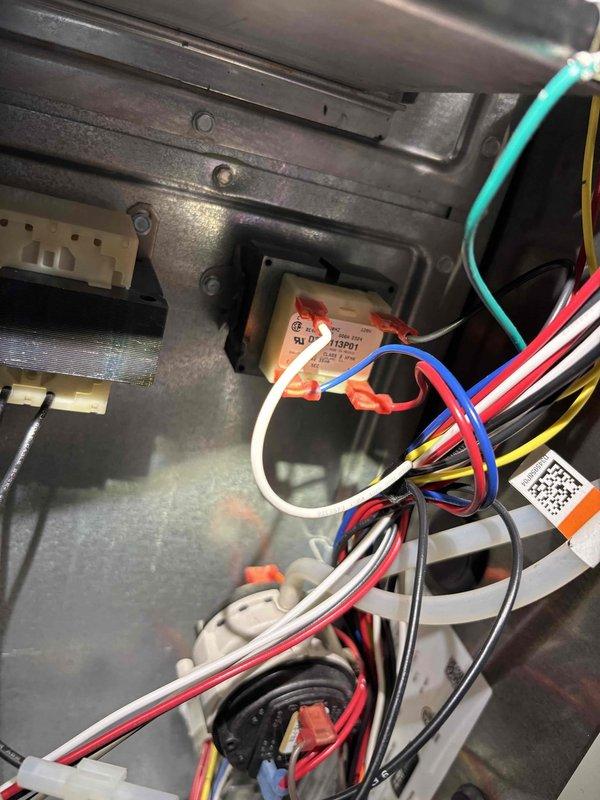 Replaced defective blower motor assembly in Trane furnace under manufacturer's warranty coverage. Disconnected existing motor wiring harness, removed failed motor from housing, installed new motor assembly, reconnected all electrical connections, and verified proper operation of heating system.