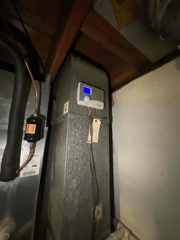 Conducted sales estimate consultation for existing heating system experiencing operational issues. Evaluated current HVAC equipment including water heater (model PRO1+50S-40N RH62) and air handler unit with digital control panel in basement utility area. Documented equipment specifications, reviewed system performance concerns, and assessed installation for proper equipment sizing recommendations to address heating deficiencies and improve home comfort.