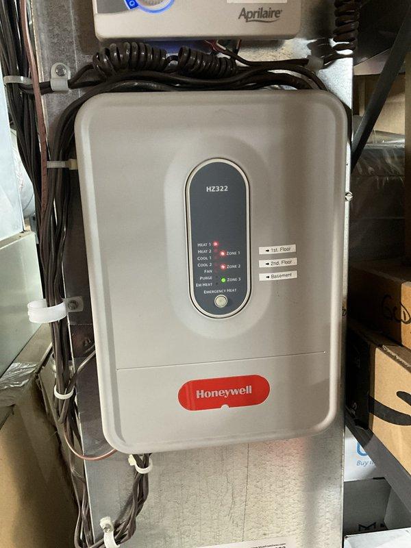 Completed comprehensive BFMA furnace tune-up on 17-year-old heating system. Performed full preventive maintenance including inspection of Honeywell Hz322 zone control system with verification of all heating zones operational, cleaned and tested furnace components, checked all mechanical connections and ductwork, and confirmed proper system operation. All equipment found functioning within normal parameters with multiple heating zones showing active status on control panel.
