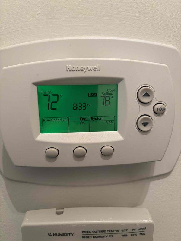 Completed comprehensive BFMA tune-up service on two 12-year-old furnace units, including full system inspection, cleaning, and performance testing. Serviced and inspected valve plates and mechanical components to ensure proper operation. Established new recurring maintenance services including humidifier maintenance, air cleaner semi-annual filter changes, and ESA furnace service program. Verified Honeywell digital thermostat operation showing system running in cooling mode at 72°F with proper display function and humidity control settings calibrated for seasonal temperature ranges.