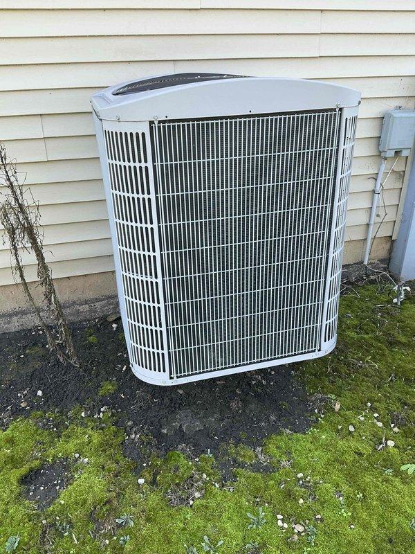 Conducted sales estimate for air conditioning system replacement with new evaporator coil at residential property. Existing outdoor condenser unit currently operational but drawing excessive amperage, indicating compressor strain and potential electrical issues. Customer recently replaced furnace and requires AC-only system replacement with basement air handler location. Assessed exterior installation site including condenser pad condition, electrical service access, and refrigerant line routing for complete system changeout proposal.