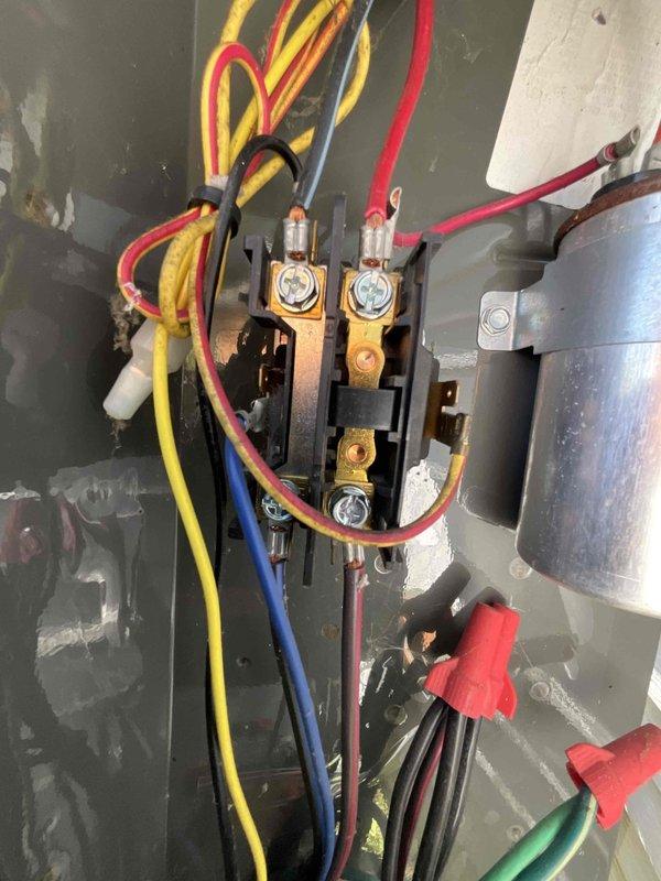 Completed comprehensive air conditioning tune-up including inspection of contactor, capacitor, and electrical connections. All components tested and found operating within normal parameters, with wiring connections secure and properly terminated.