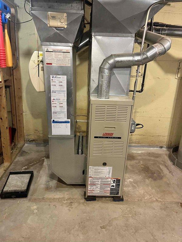 Completed full HVAC system installation consisting of a Lennox SL280 two-stage variable speed furnace with 80% efficiency rating and a Lennox EL15 air conditioning unit rated at 15 SEER. Installed new EcoBee 6th generation thermostat to provide enhanced climate control and system management. Configured split system with proper refrigerant charging using R-454B, verified all electrical connections, and tested two-stage heating and variable speed blower operation for optimal performance. Ensured proper ductwork connections, sealed all joints, and confirmed adequate airflow throughout the system. Performed complete system startup, programmed thermostat settings, and verified all safety controls and limit switches are functioning correctly.