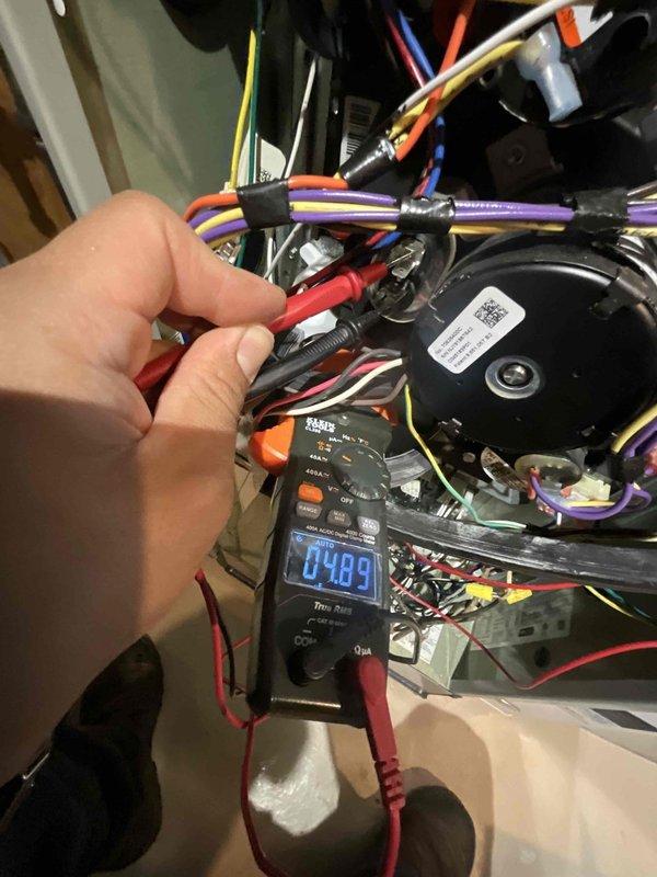 Completed comprehensive BFMA tune-up service on 7-year-old furnace and humidifier system. Performed full electrical diagnostics on blower motor assembly, verified proper voltage readings at 84.89V, and inspected all wire connections and harnesses for secure operation. Conducted standard maintenance protocol including inspection of all mechanical components, plumbing connections, and auxiliary systems to ensure optimal heating system performance for the upcoming season.