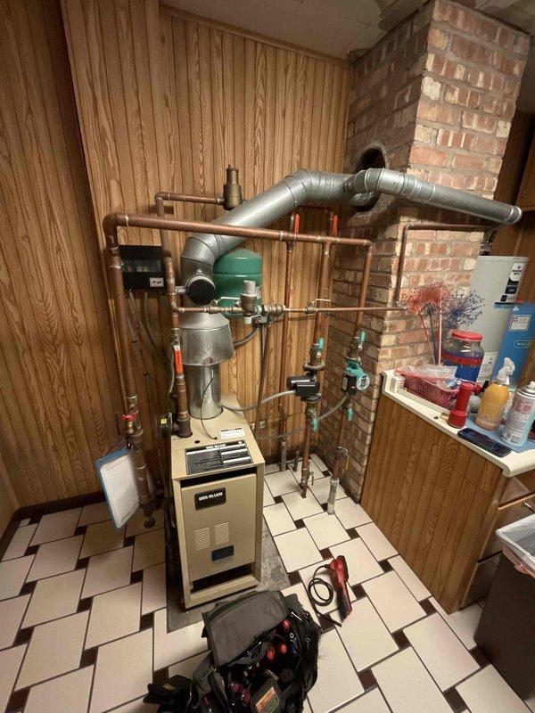 Responded to no heat call for residential property with both furnace and boiler reported as inoperative. Upon arrival, inspected mechanical room housing heating equipment including boiler unit and associated hydronic piping system with expansion tank. Evaluated electrical connections, thermostat signals, and control boards on both heating units. Checked gas supply, pilot assemblies, and ignition systems. Tested pressure switches, limit switches, and safety controls. Verified proper operation of circulator pump and zone valves throughout copper piping distribution system. Restored heat to property and confirmed all heating equipment functioning properly before departure.