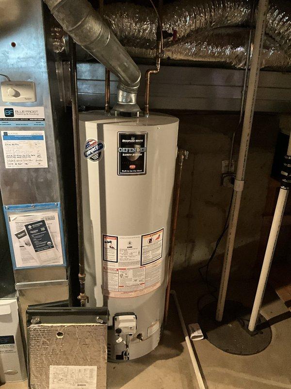 Completed comprehensive BFMA tune-up service on residential heating system including furnace, boiler, humidifier, and air cleaner maintenance. Performed thorough inspection and servicing of all HVAC equipment in basement mechanical room, verified proper operation of furnace unit with existing Blue Frost documentation, and inspected boiler system alongside Bradford White water heater. Conducted semi-annual air cleaner filter change, humidifier service, and complete system diagnostics to ensure optimal performance of all heating components for the upcoming season.