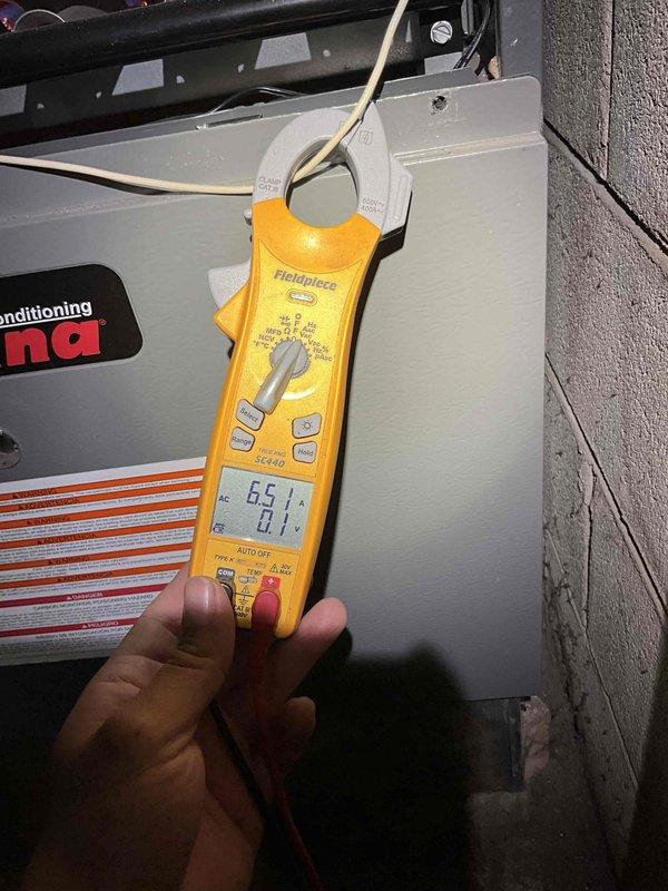 Completed commercial RTU and furnace tune-up maintenance at facility. Performed electrical diagnostics on air conditioning unit, measuring compressor amperage at 6.51A using clamp meter to verify proper operation. Inspected furnace unit and ductwork in mechanical room, noting filters require replacement. Picked up replacement filters from headquarters and provided estimate for filter change service. All equipment operational at time of service completion.